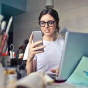 Young entrepreneur using a smartphone.
