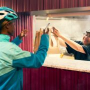 Deliveroo driver picking up an order.