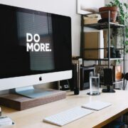 Orderly digital workplace with a screen saying 'do more'.