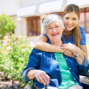 Nurse with nursing home resident.