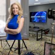 Woman inset on image of a digital media studio.