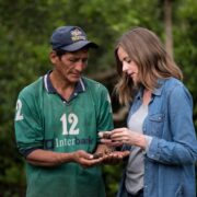 Woman and man in rainforest in Peru.