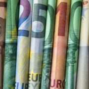 rolls of euro notes.