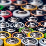 Large, colourful cluster of batteries to denote the circular economy.