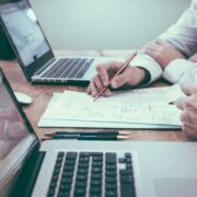 Business owners working out their costs.