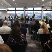 People speaking at an event.