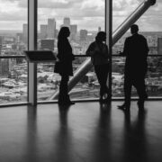 People in a top floor of a business discussing the future.