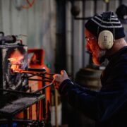 Man making a knife.