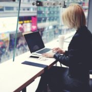 A young woman working on her laptop.