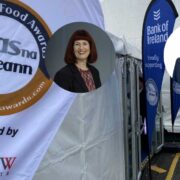 Man and woman inset on images of tents at Blas in Dingle.