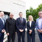 Four men and one woman outside an Ericsson building in Athlone.