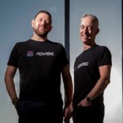 Two men in black t-shirts.