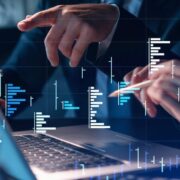 People studying financial data.