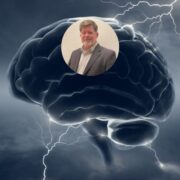 Man inset on image of a brain.