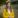 Woman in yellow jacket.