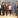 Group of smartly dressed men and women.