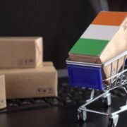 Online shopping trolley with a box with an Irish flag on it.
