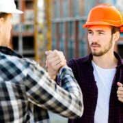 Energy engineers shaking hands.