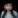 Woman with blurry face, indicating imposter syndrome doubts.