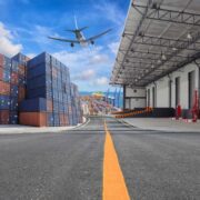 Shipping containers and a jet.