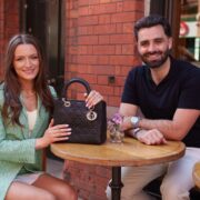 Man and woman sitting at a table.
