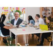 Man inset on image of a project team at work.