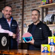 Two men in a brewery.