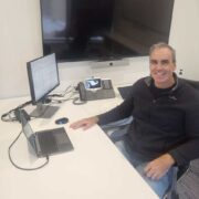 Man sitting at desk.