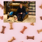 Man beside golden retriever.