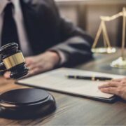 Judge with gavel deciding the future of a business.
