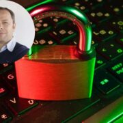 Man inset on picture of a lock on a keyboard.