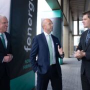 Three men in suits.