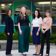 Four business women outside a building in Dublin.