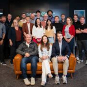 Large group of people at the launch of an AI accelerator.