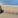 Woman inset on image of a beach in the west of Ireland.