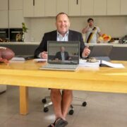 Man sitting at desk.