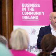 Man speaking at an event.