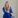 Fair-haired woman in blue suit.