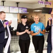 Group of people opening a Taco Bell restaurant in Ireland.