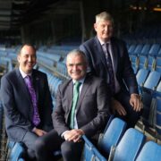 Three men in the stands at Croke Park.