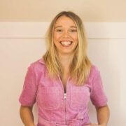 Woman in pink jumpsuit.