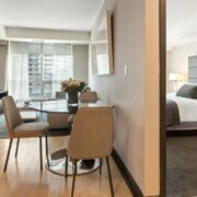 Interior shot of a hotel bedroom.