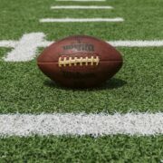 American football on a marked pitch.