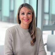 Smiling woman in an office.