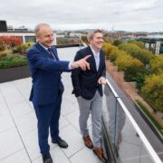 Two men on a rooftop in Dublin.