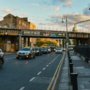 Commuter walks to work past a traffic jam in Dublin.