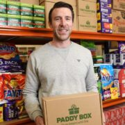Man holding a Paddy Box.