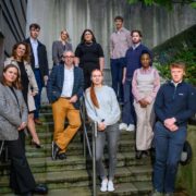 Young start-up founders standing on steps at UCC Cork.
