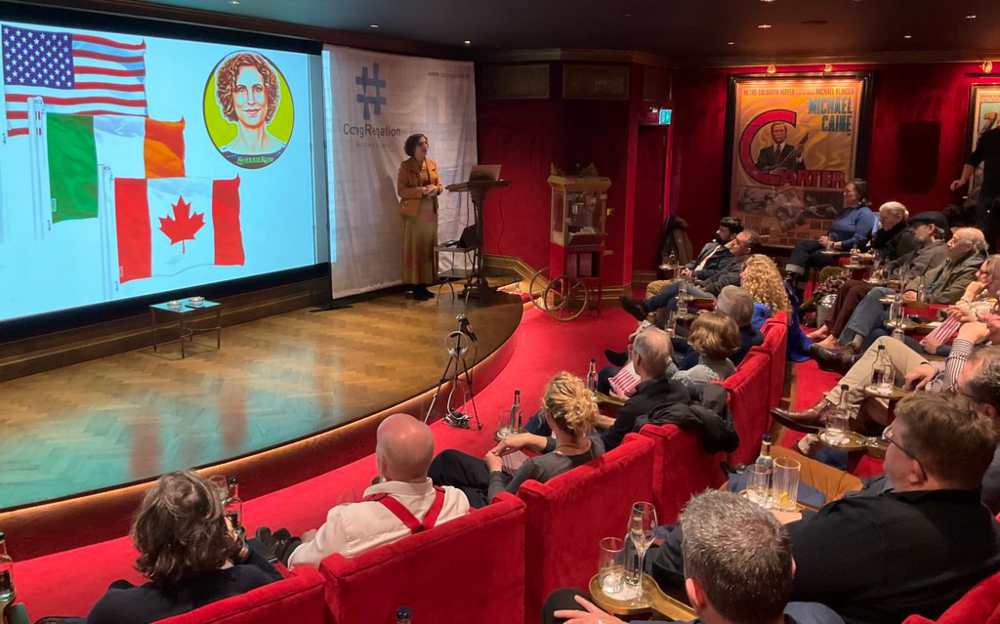 Woman speaking on stage at CongRegation in 2024.