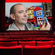 Man with Bluey characters inset on movie theatre.